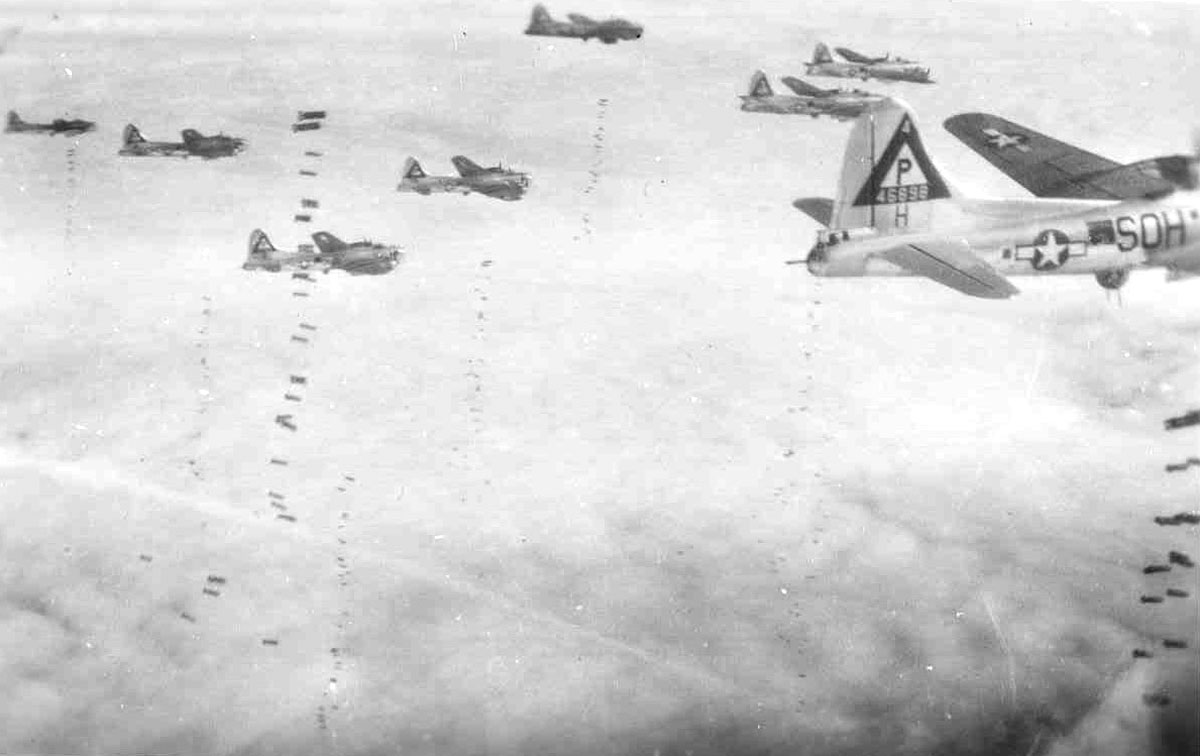 Boeing B-17 Flying Fortresses in formation on a bomb run, period photograph